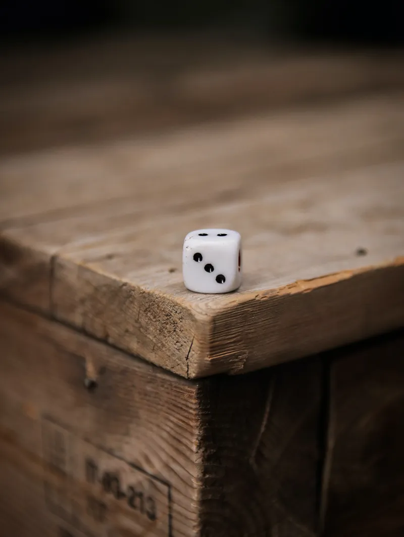 a die set on a wooden table