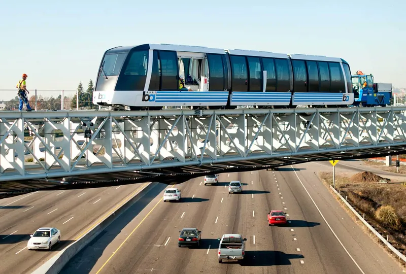 A train car going over a highway